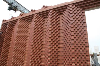 a range of red special bricks create a stunning precast panel case study